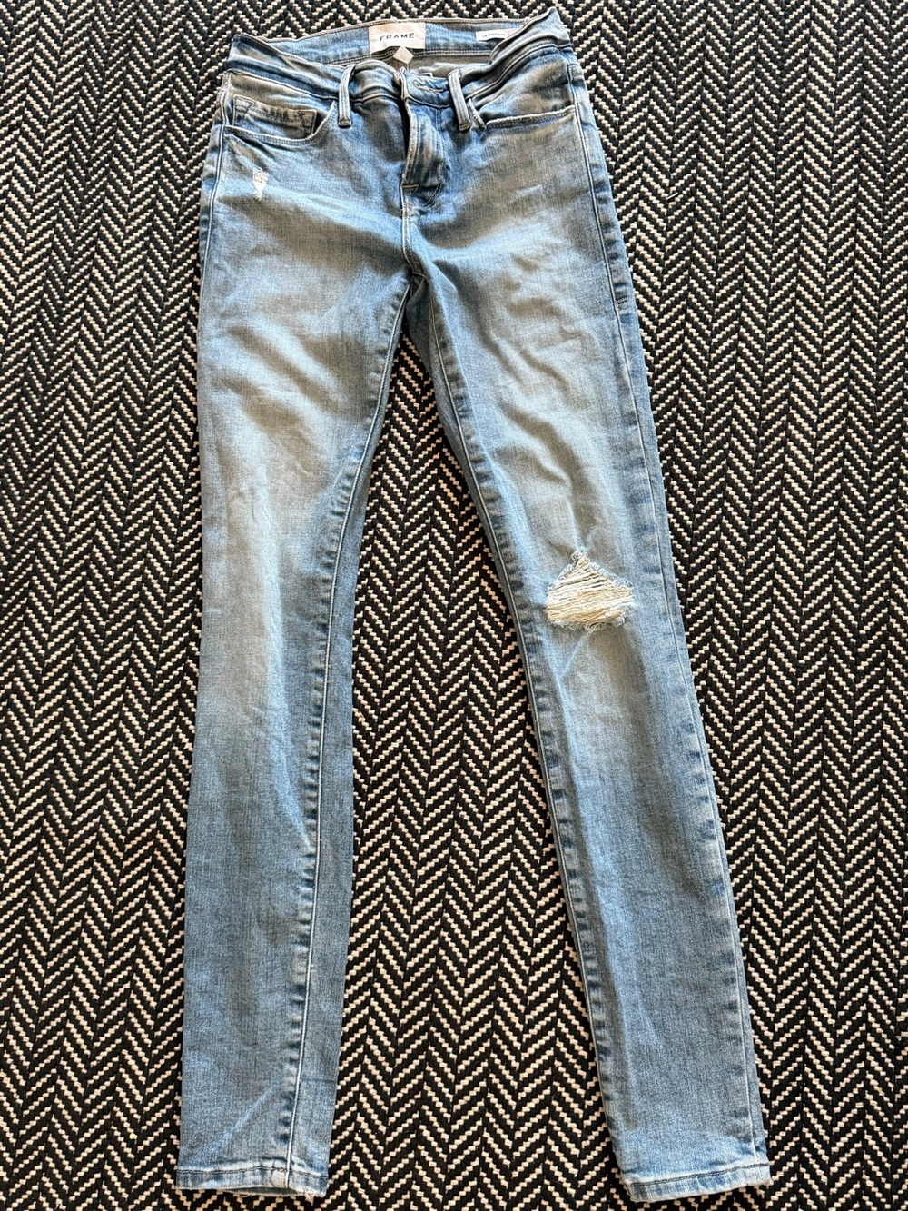 Frame Denim Light Wash Skinny Jeans with Knee Distress